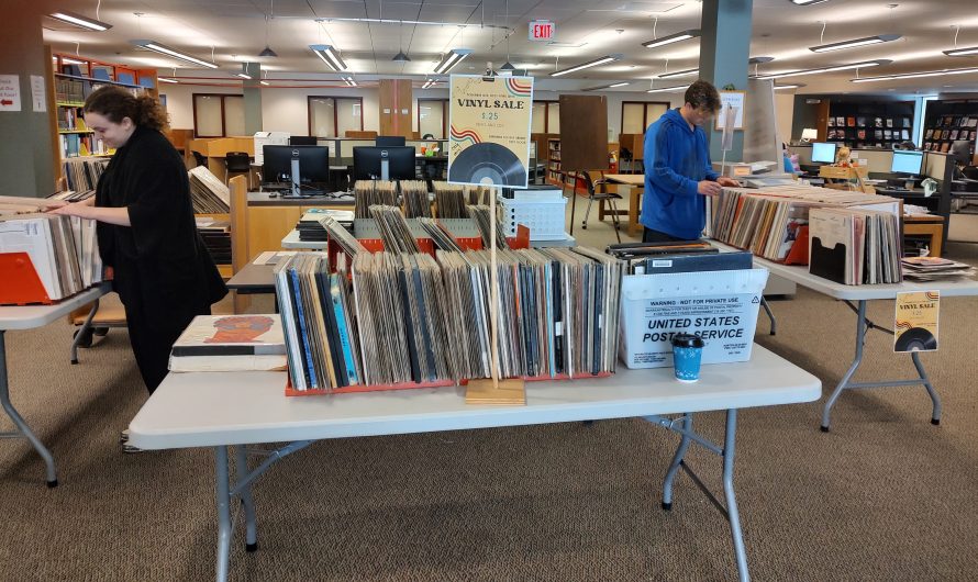 Library Holding Vinyl and CD Sale