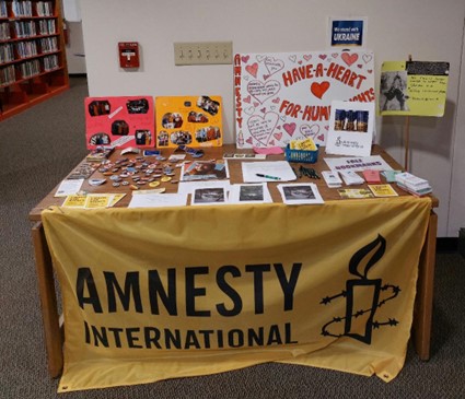 Amnesty Table Display in College Library