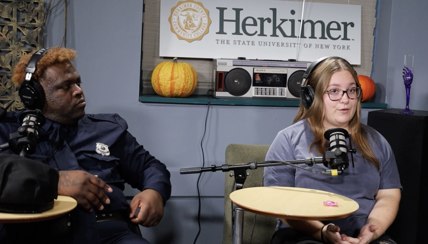 two students in a podcast