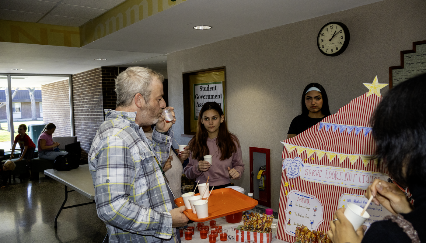 A man samples a mocktail in the RMCC building.