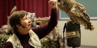Cindy Page points out features of the Barn Owl during her presentation on Monday. (Scott Kinville)