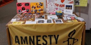 Amnesty Table Display in College Library