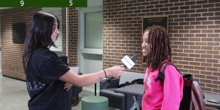 Abeni interviews student
