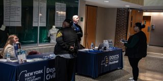 Students stopping by informational table