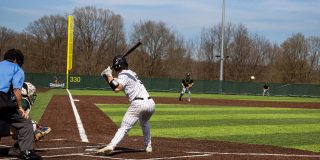 Player at bat on new field