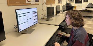 Student using Herkimer College computer lab in Johnson hall 107