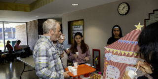 A man samples a mocktail in the RMCC building.